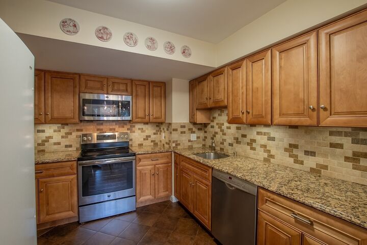Property Photo:  250 Hammond Pond Parkway 102N  MA 02467 