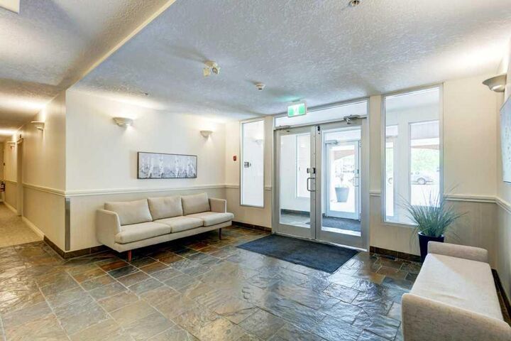 Property Photo:  2 Hemlock Crescent SW 105  AB T3C 2Z1 