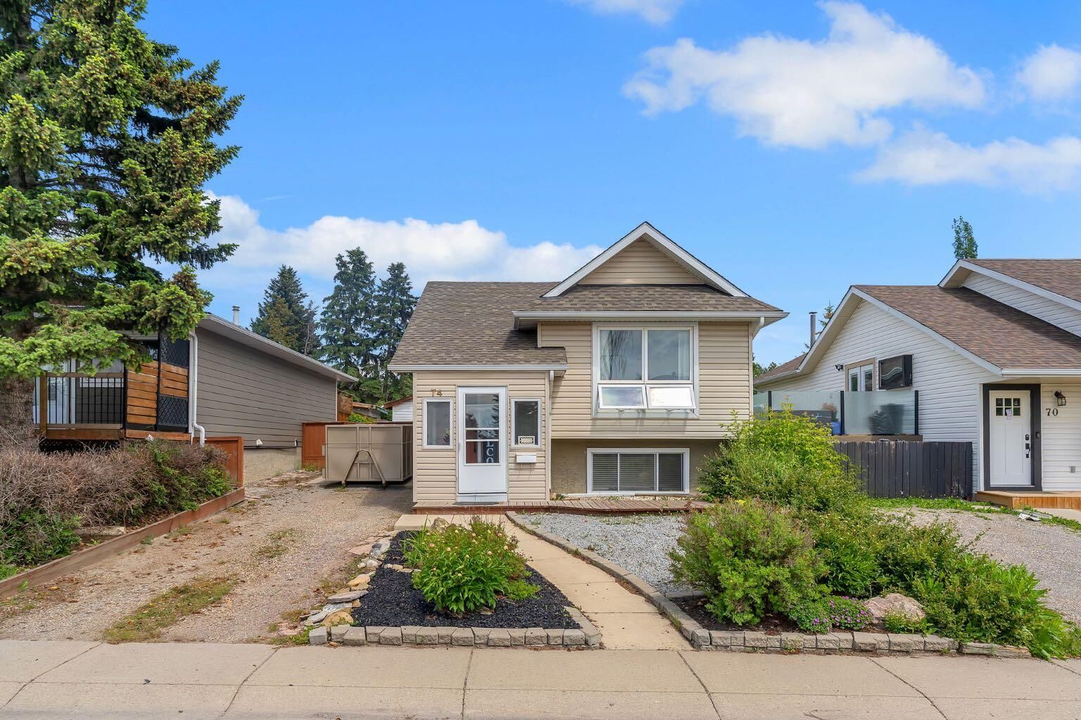 Property Photo:  74 Eldorado Road SE  AB T4B 1C1 