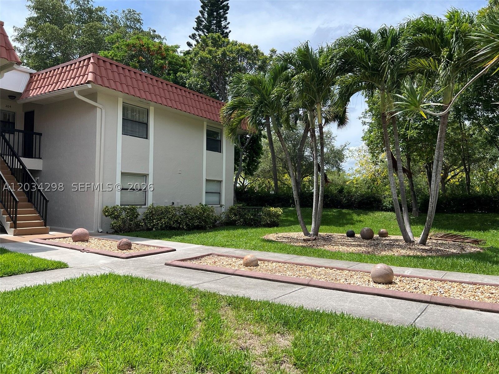 Property Photo:  9710 Hammocks Blvd 204-31  FL 33196 