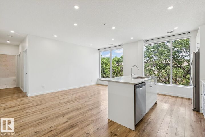 Property Photo:  11503 76 Avenue NW 415  AB T6G 0K6 