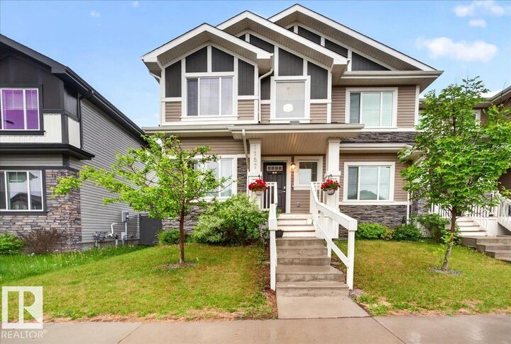 Property Photo:  1187 Cy Becker Road NW  AB T5Y 3V9 
