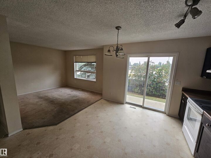 Property Photo:  3 Grove Meadow Drive 27  AB T7X 4L9 