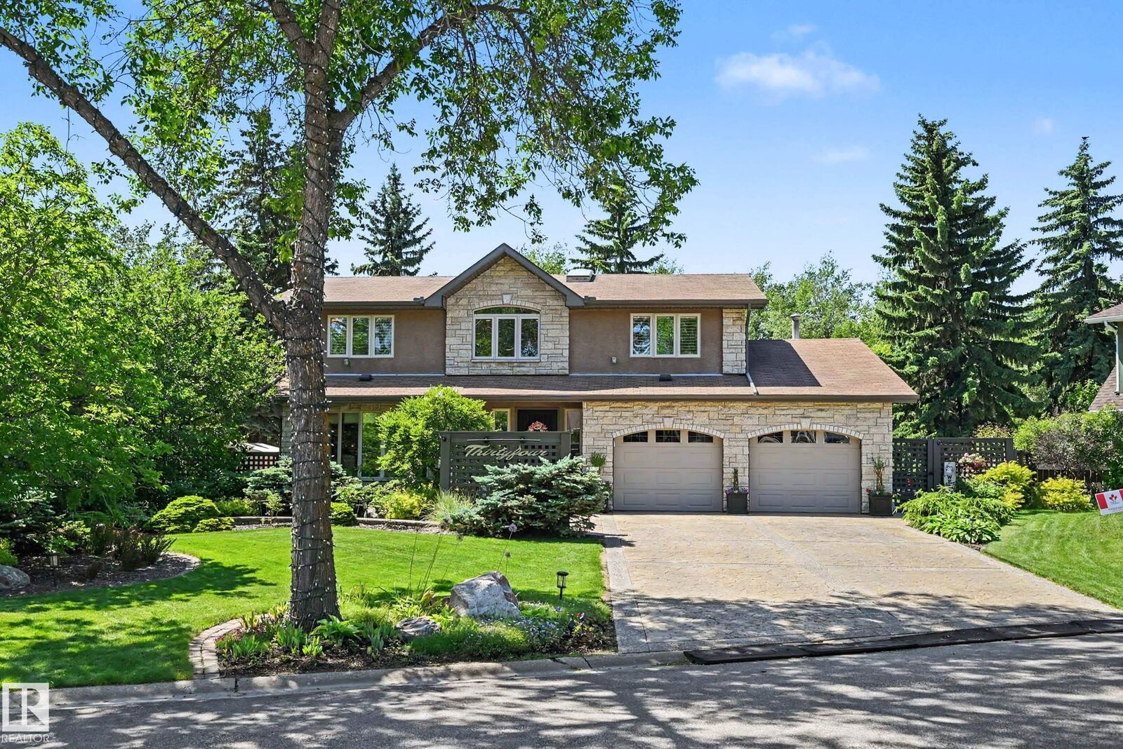 Property Photo:  34 Lodgepole Crescent  AB T8N 2R7 