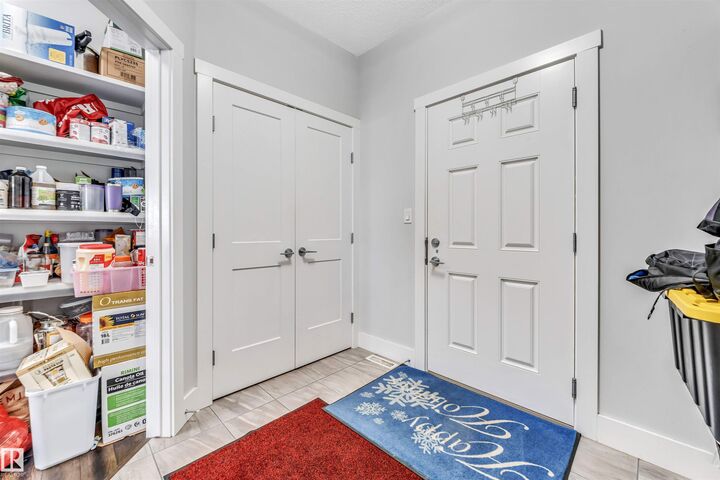 Property Photo:  8516 216 Street NW  AB T5T 4W2 