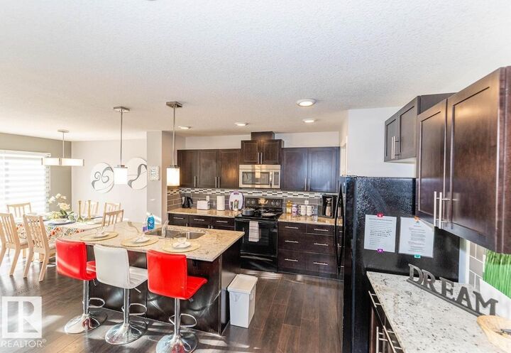 Property Photo:  5883 Anthony Crescent SW  AB T6W 3H4 