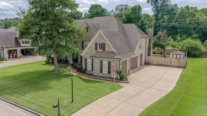 Property Photo:  1045 Woodldand Glade Cv N  TN 38018 