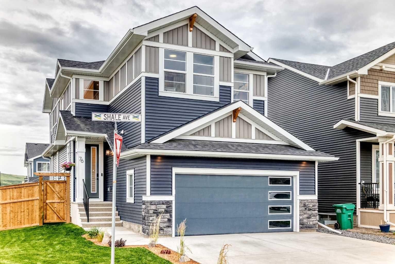 Property Photo:  76 Shale Avenue  AB T4C 3G6 