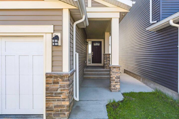 Property Photo:  1456 Livingston Way NE  AB T3P 0Z4 