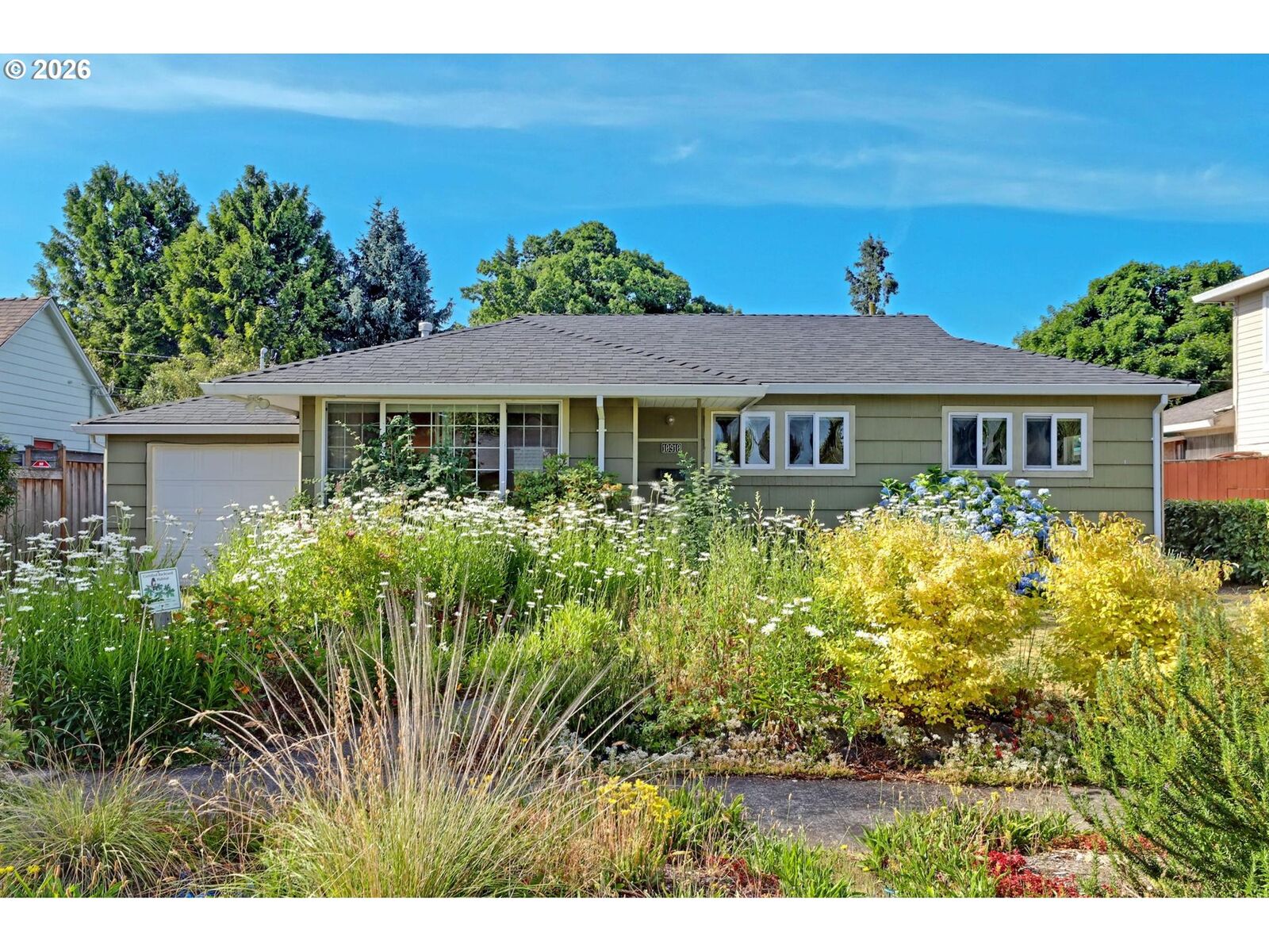 Property Photo:  10910 NE Eugene St  OR 97220 