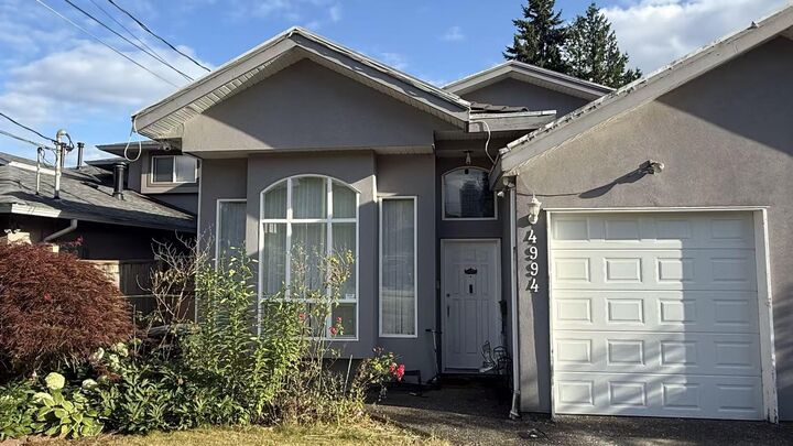Property Photo:  4994 Victory Street Main House  BC V5J 1S6 