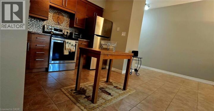Property Photo: 10 Woodman Drive South 108 ON L8K 4E1