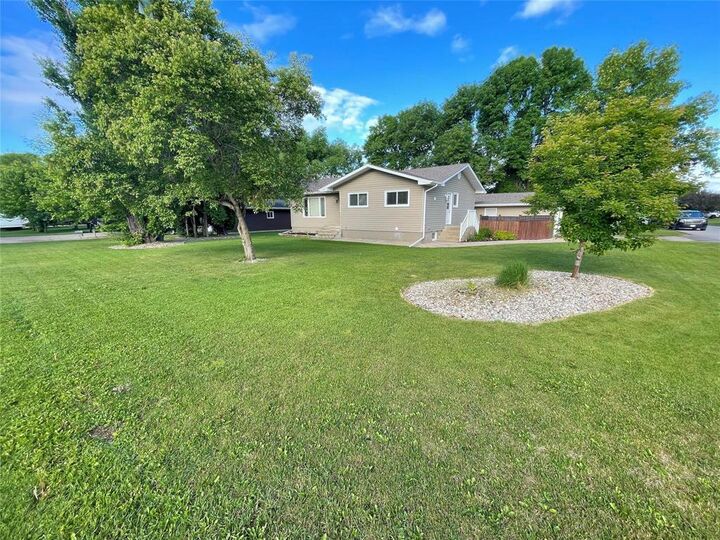 Property Photo:  459 Main Street  MB R0K 0H0 