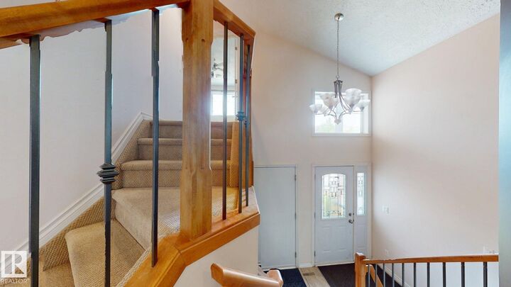 Property Photo:  5129 1B Avenue SW  AB T6X 0Z7 