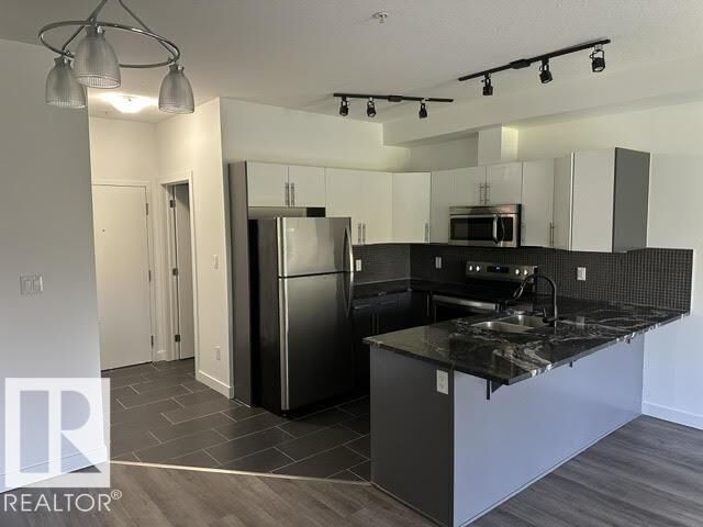Property Photo: 10611 117 Street NW 402 AB T5H 0G6