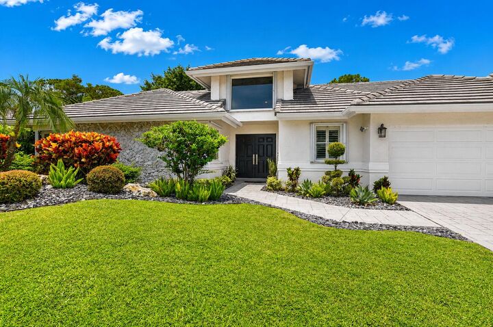 Property Photo:  4480 NW 28th Avenue  FL 33434 