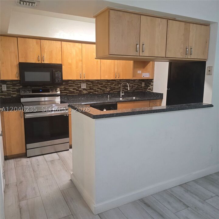 Property Photo:  8401 SW 107th Ave 147E  FL 33173 