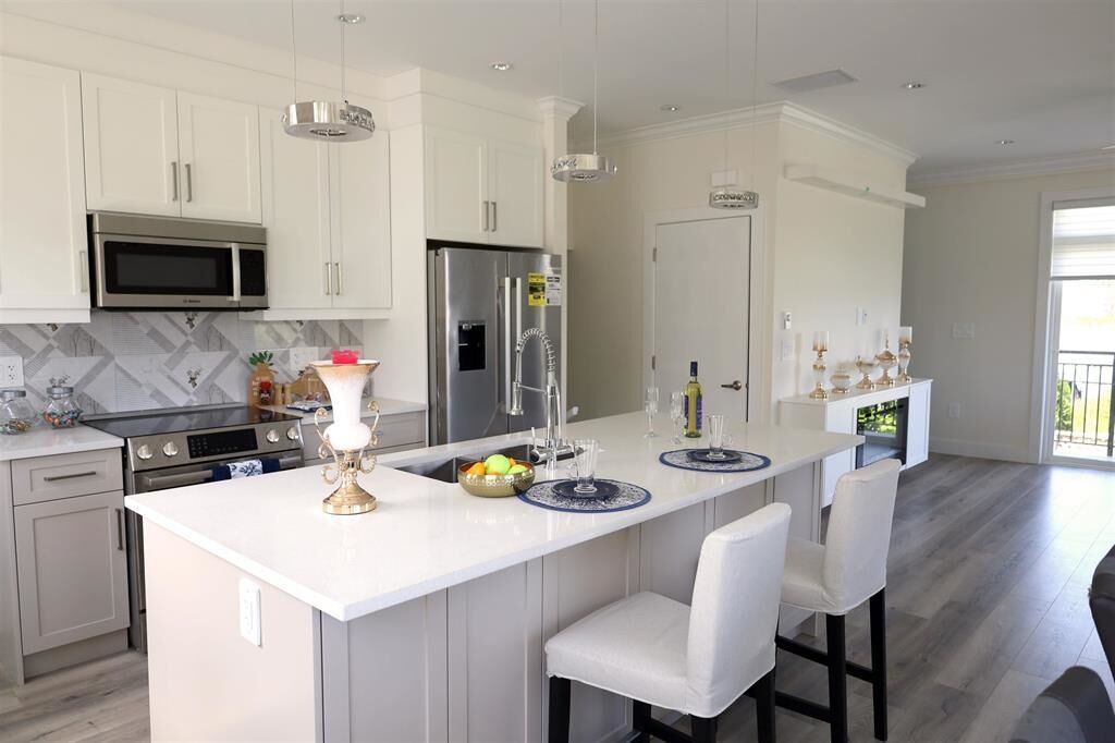 Property Photo:  8181 135A Street 2  BC V3W 3N8 