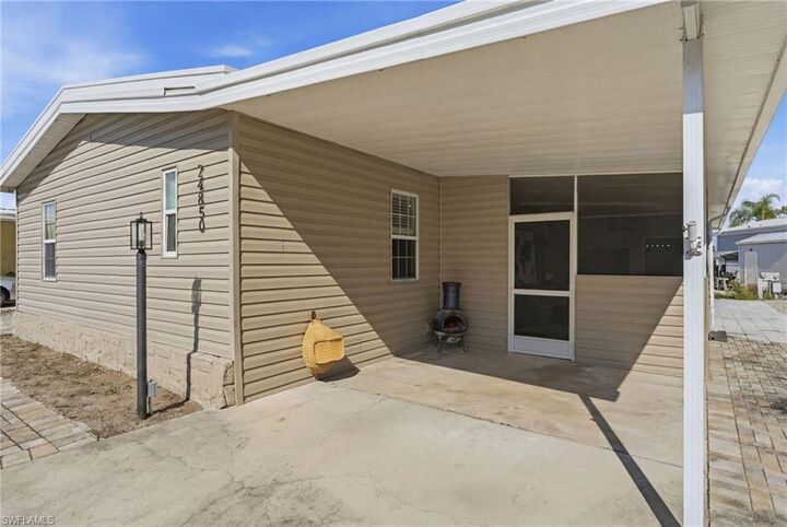 Property Photo:  24850 Windward Blvd  FL 34134 