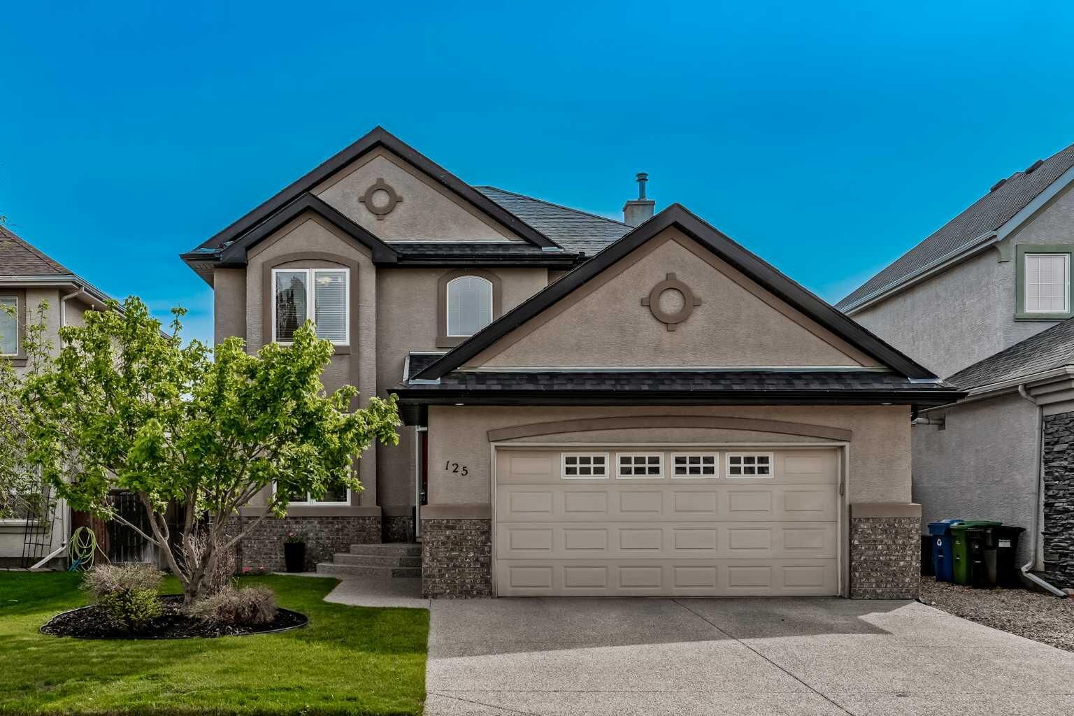 Property Photo:  125 Cranleigh Park SE  AB T2M 1H3 