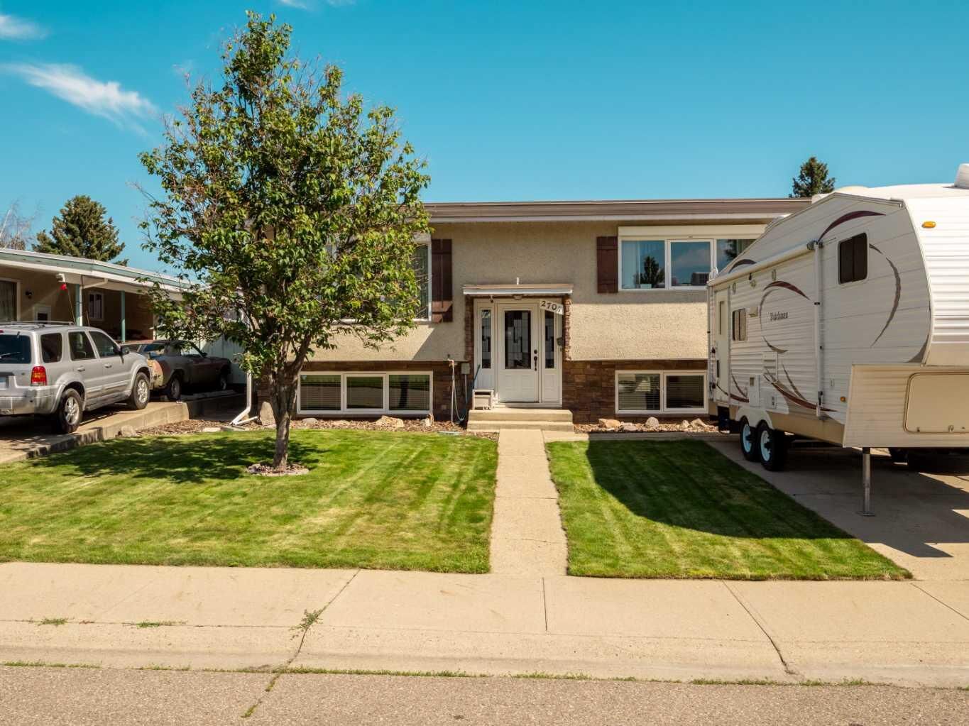 Property Photo: 2707 11 Avenue N AB T1H 1N5