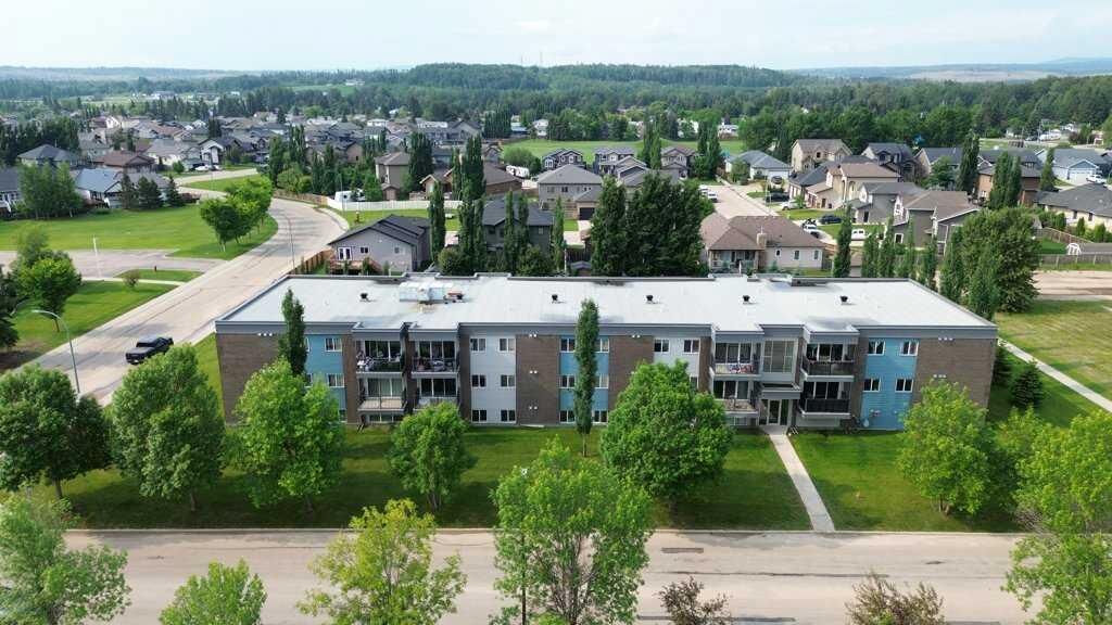 Property Photo: 709 6 Ave SE 102 AB T0G 2A3