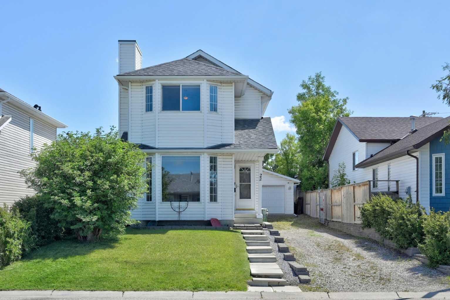 Property Photo:  22 Rivercrest Way SE  AB T2C 4J8 