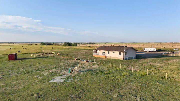Property Photo: 578099 83 Street E AB T1V 1R7