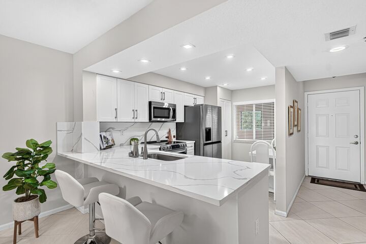 Property Photo:  12540 Majesty Circle 303  FL 33437 