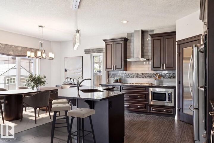 Property Photo: 2665 Watcher Way SW AB T6W 0X6