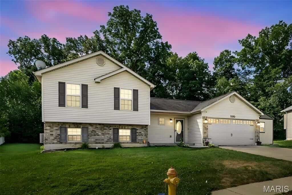 Property Photo:  1102 Marathon Drive  MO 63348 