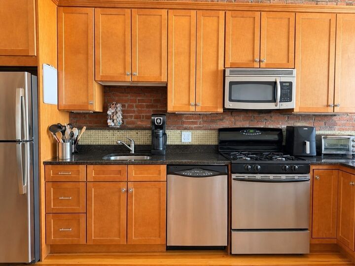 Property Photo: 410 E 3rd St 1 MA 02127