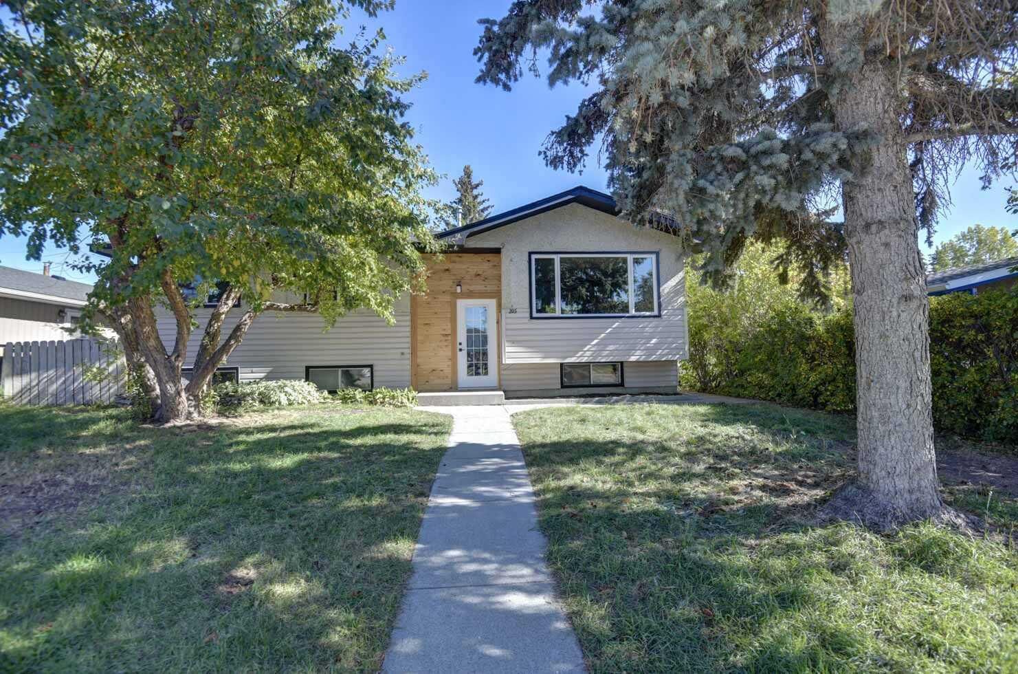 Property Photo: 205 Allan Crescent SE AB T2J 0T3