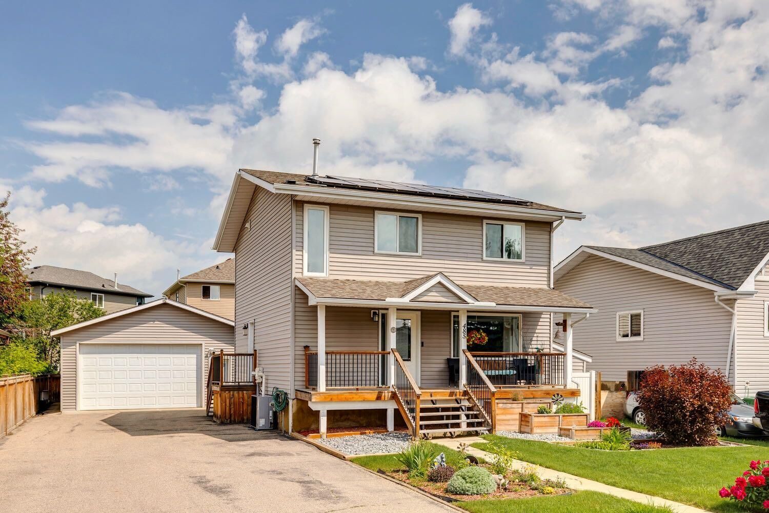 Property Photo: 485 Big Springs Drive SE AB T4A 1A3