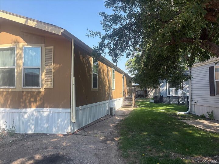 Property Photo:  3650 S Federal Boulevard  CO 80110 