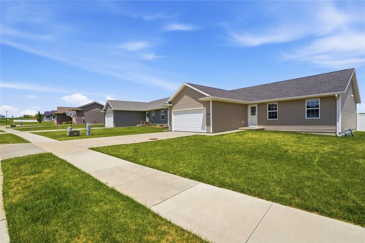 Property Photo:  114 Blue Jay Avenue  IA 52349 