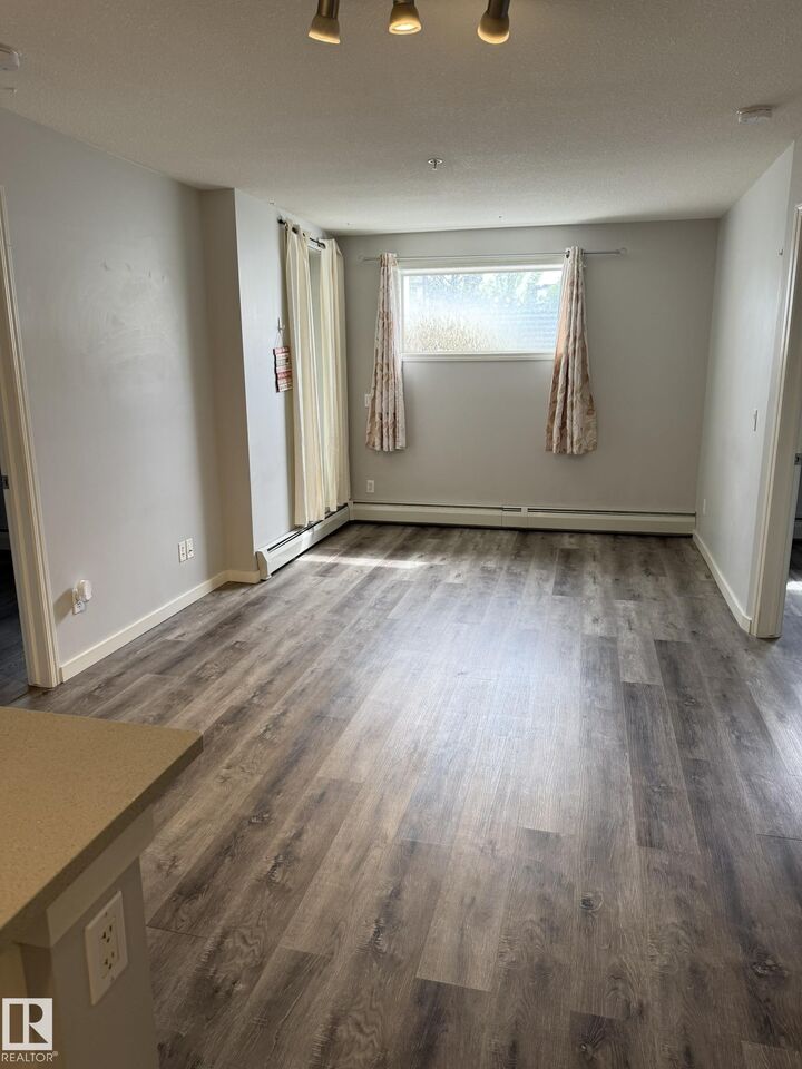 Property Photo: 40 Summerwood Boulevard 106 AB T8H 0C2