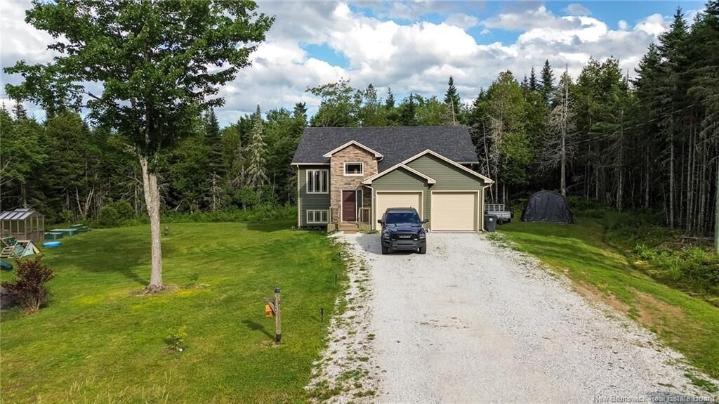 Property Photo: 18 Castlewood Drive NB E5N 0K7