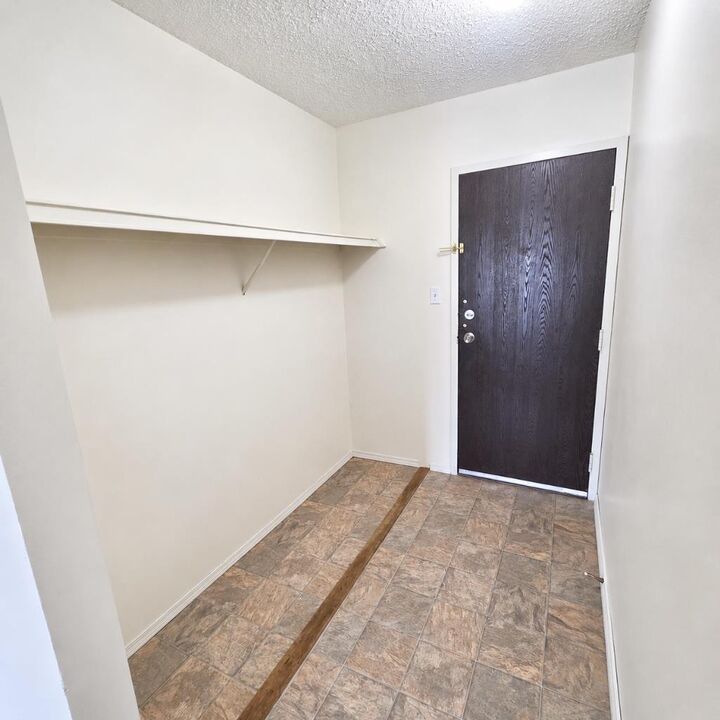 Property Photo: 5611 10 Avenue 316A AB T7E 1R4