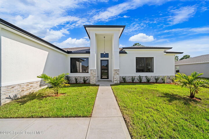 Property Photo: 1356 Walthan Street SE FL 32909