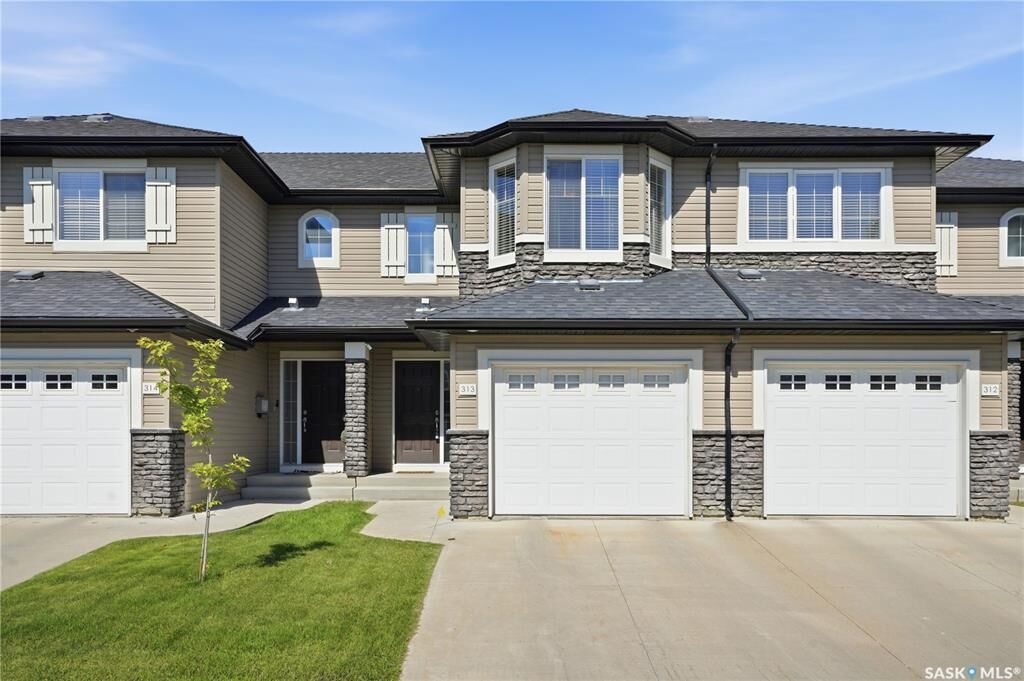 Property Photo: 410 Ledingham Way 313 SK S7V 0C4
