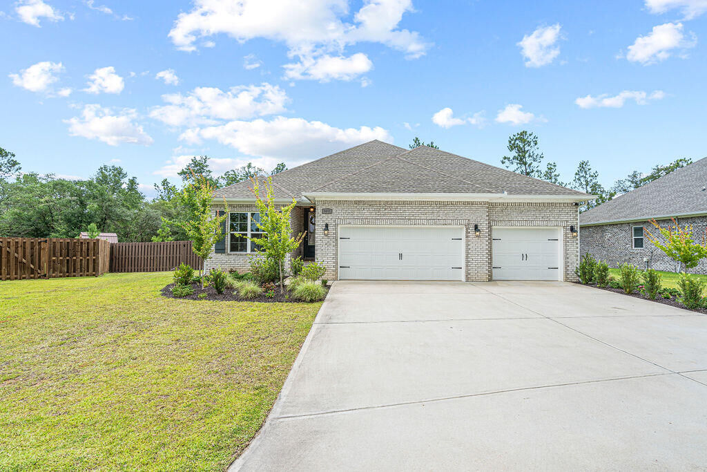 Property Photo:  9051 Bird Song Circle  FL 32583 
