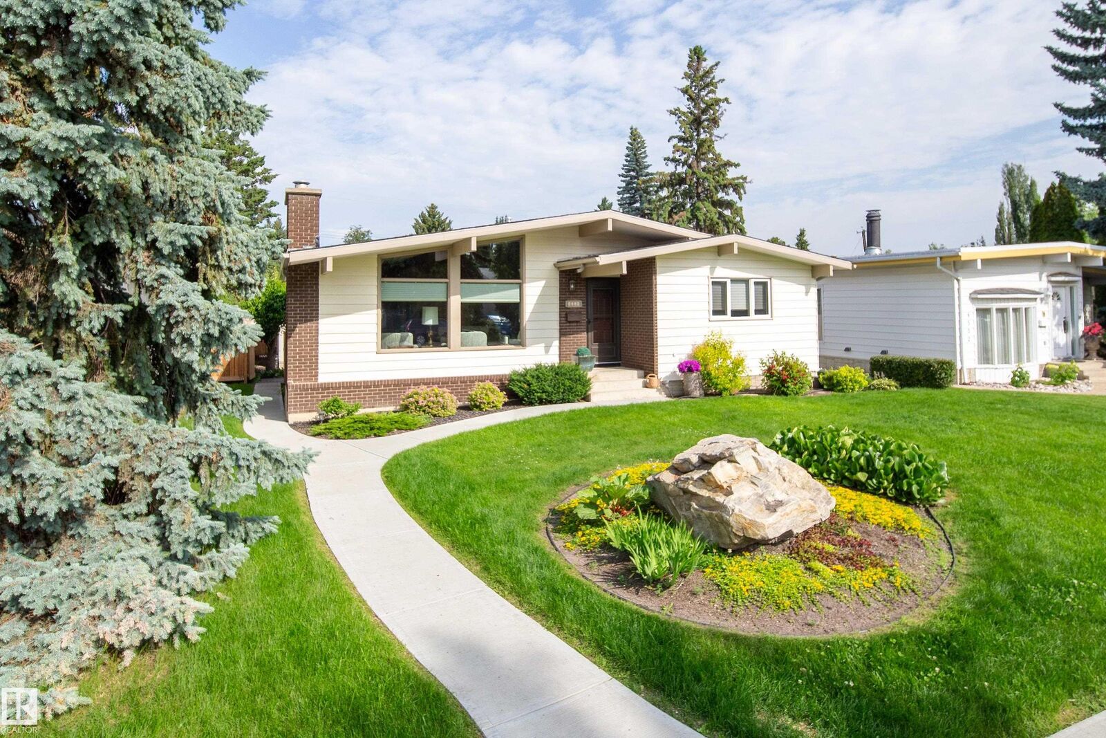 Property Photo: 4328 116 Street NW AB T6J 1R9