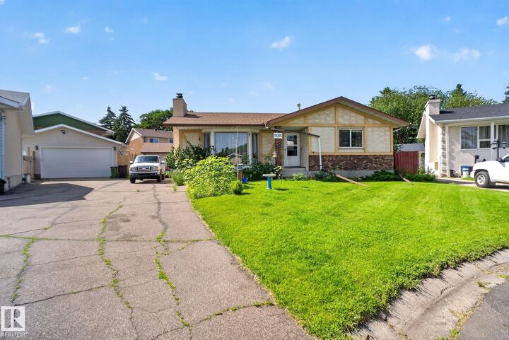 Property Photo: 13050 32A Street NW AB T5A 3E5