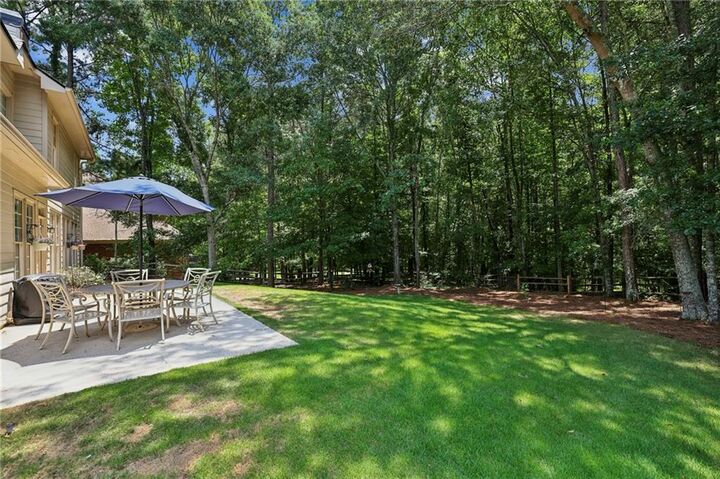 Property Photo:  6930 Olde Atlanta Parkway  GA 30024 