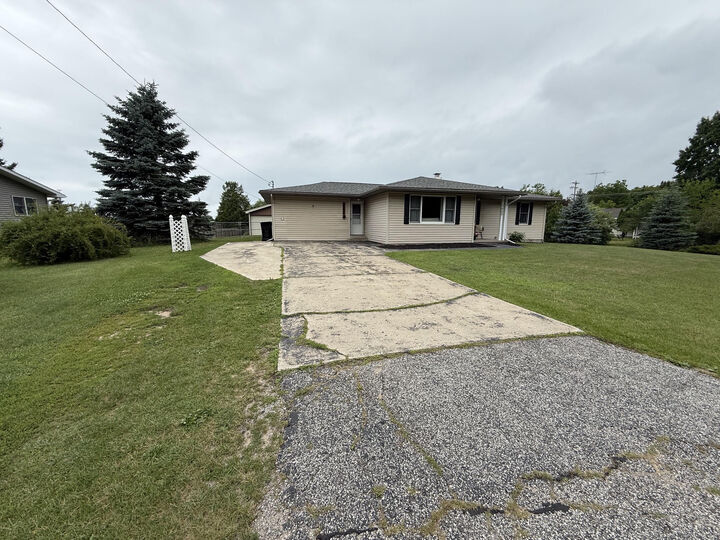 Property Photo:  1400 Perry Street  MI 49660 