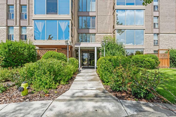 Property Photo: 4554 Valiant Drive NW 104 AB T3A 2V5