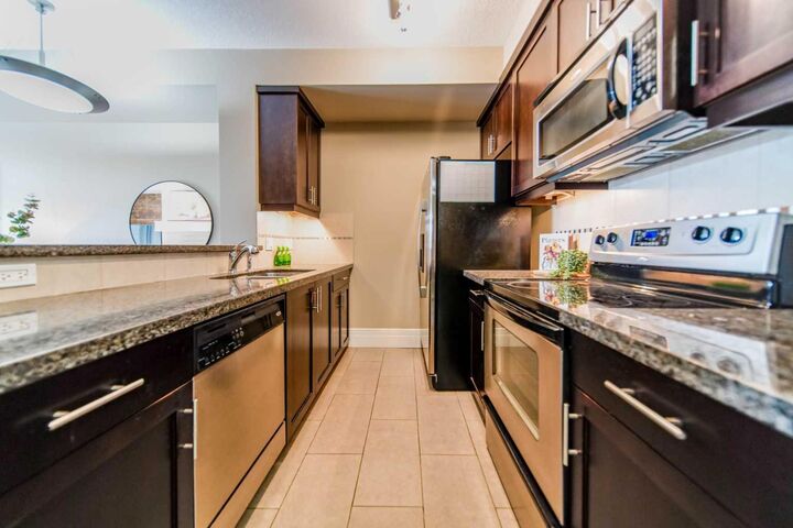 Property Photo:  518 33 Street NW 208  AB T2N 2W4 