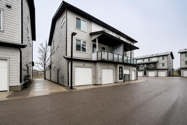 245 Redstone Walk NE 202 — photo 1