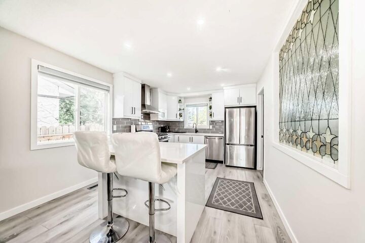 Property Photo:  6712 23 Avenue NE  AB T1Y 1V4 